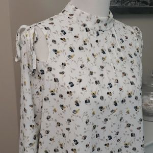 Cold shoulder high neck floral blouse